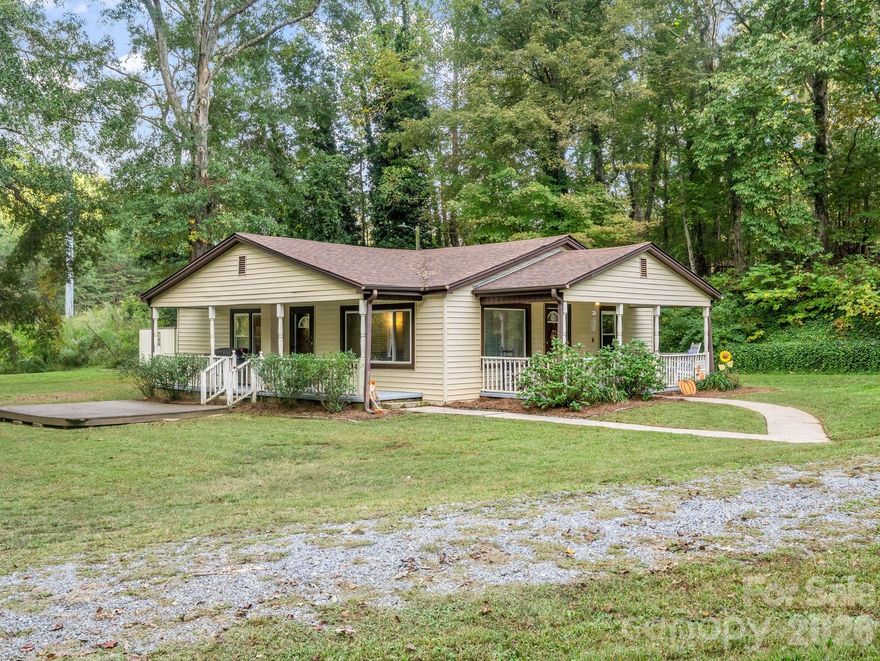 Charming 3-bedroom home on over 1 acre just outside of Forest City town limits offering the perfect blend of comfort, convenience, and space! This open-concept home sits on nearly an acre and a half— giving you plenty of room to spread out while staying close to town. Enjoy relaxing or entertaining outdoors with two covered porches, and a large back deck, perfect for gatherings or quiet evenings. Inside, you’ll love the bright and open living area that flows easily between the kitchen, dining, and family spaces—ideal for everyday living. The spacious laundry room adds extra functionality and storage options. If you’re looking for a peaceful setting with the convenience of being minutes from shops, dining, and schools —this is the one!