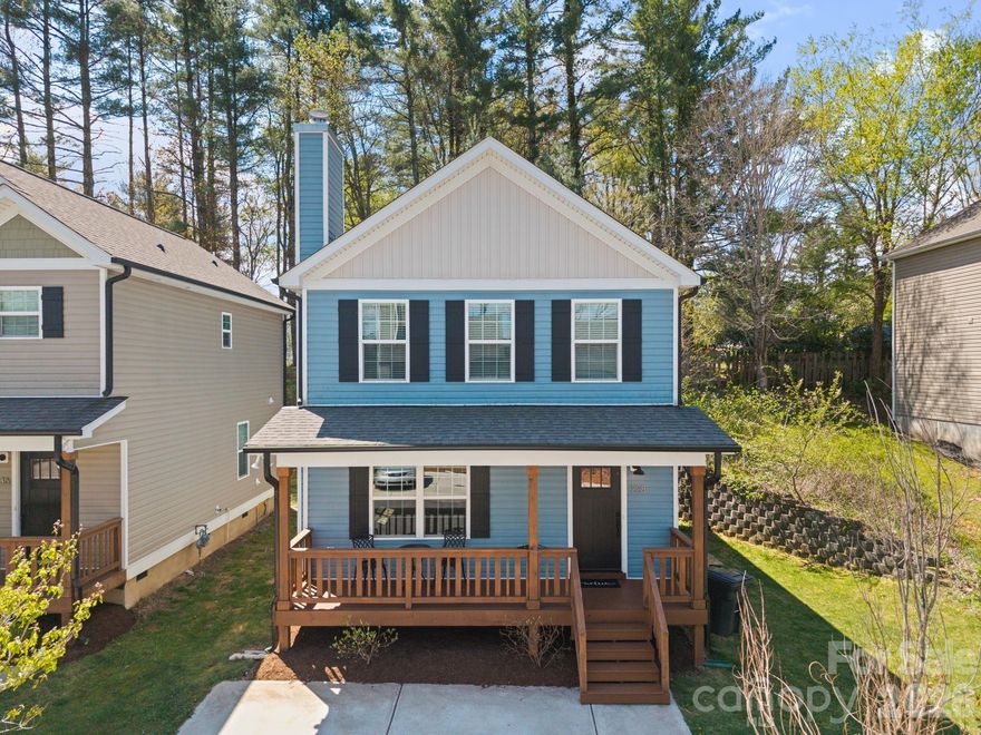 This 2022-built home has been freshly cleaned and touched up, offering a like-new feel in a convenient location less than 5 minutes to New Market Center and 10 minutes from downtown Boone and Appalachian State University. Tucked along a quaint street, the setting feels quiet while keeping you near town. Front and back decks provide welcoming spaces to relax and enjoy the mountain air. Inside, the main level features an open floor plan with a living room anchored by a natural gas stone fireplace, a dining area, and a well-appointed kitchen complete with pantry. The back door leads to a small deck for grilling. A half bath and laundry room (washer and dryer included) complete the main level. Upstairs, the layout includes three bedrooms, highlighted by a bright primary bedroom with walk in closet and an ensuite bath featuring a walk-in tiled shower and double sink vanity. Two additional bedrooms and a second full bathroom finish out the upper level. Additional visitor parking is across the street, and the neighborhood includes a small dog yard. This property delivers a newer build, practical layout, and a location that’s hard to beat, along with city water and sewer. Nearly impossible to find a newer home this near to Boone in this price range. Vacant and easy to show.