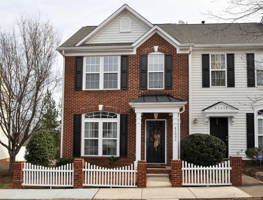 END UNIT with brick front exterior & white picket fence! Clean & Move-in Ready! Washer, dryer & refrigerator all included! Large kitchen island, gas range, overhead microwave, laminate flooring in living, dining & den, bay window in dining room, tray ceiling & large walk-in closet in master bedroom, double bowl vanity in master bath, utility room, French doors, security system, plus much more! Convenient to shopping, restaurants & downtown Waxhaw. USDA Financing! Hurry, won't last long!