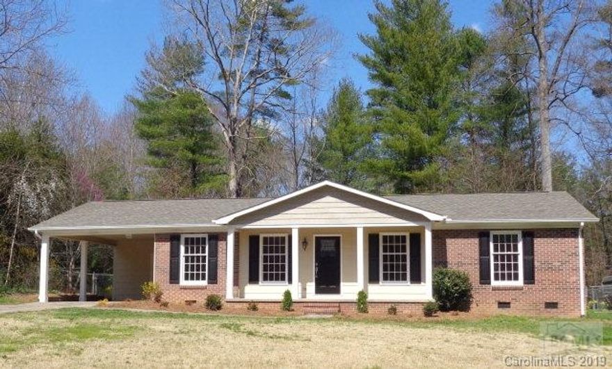 You must see this completely renovated 3BR, 2BA. This home has everything you could dream of. Walk inside from the covered front porch into an extra wide hallway. To your left you will find a huge living room w/beautiful windows that allow tons of natural light. New flooring, paint, and updated light fixtures welcome you in this room. Down the hall you will find a cozy den w/fireplace. Conveniently located to the entertaining areas of this home is a brand new full bathroom with beautiful ceramic tile, quartz countertops, and a brand new bathtub. Down the hall you will find two bedrooms with new carpet. These bedrooms have beautiful windows allowing natural light. The master bedroom is complete with an en suite bathroom. En suite bathroom has ceramic tile, quartz countertops, and a brand new bathtub. Just off the den is a beautiful kitchen with ceramic tile flooring, granite countertops, update light fixtures, and brand new Samsung stainless steel appliances including a gas range. Kitch