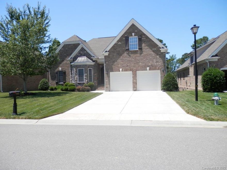 Beautiful ranch home with unfinished bonus room, see-thru fireplace, master bedroom w/tray ceilings & sitting area, master bath w/separate double sink, separate shower, and jetted tub. Kitchen w/granite countertops, 2 car attached garage, covered back patio, community pool, golf course.  Must see to appreciate.