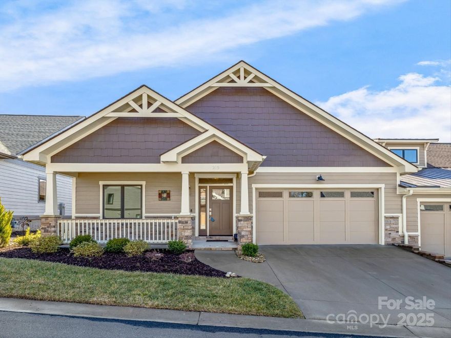This stunning duplex is in a prime location near the Sports & Fitness Center, Clubhouse with a restaurant, meeting/card rooms, library, and a year-round golf course. The open floor plan allows you to customize your space with upgraded quartz countertops, wood flooring, GE Profile appliances, cabinets, vanities, faucets, light fixtures, paint colors, custom closet designs, and an Electrolux washer and dryer. A remote-controlled fireplace with cultured stone to the ceiling adds warmth and charm. The community features a stream-fed fishing pond, fire pit, and gathering space. Residents enjoy access to a heated pool, spa, tennis, pickleball, bocce ball, and various social activities. The Fitness Center includes an exercise room, aerobics, and a massage room. Specific membership fees apply in addition to POA & HOA Fees. Experience a vibrant lifestyle with top-tier amenities in a beautiful setting!