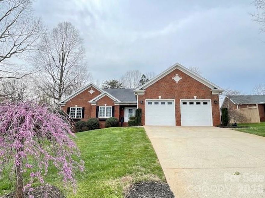 Enjoy effortless single level living in the highly desirable golf course community of Catawba Springs. This beautifully maintained 3 bedroom, 2.5 bathroom home offers a bright, open floor plan designed for both everyday comfort and easy entertaining. The inviting living room features recessed lighting, a cozy gas log fireplace, and custom built-ins, creating a warm and welcoming atmosphere. A spacious dining room provides the perfect setting for gatherings, enhanced by elegant wainscoting and a tray ceiling. The modern kitchen is both stylish and functional, complete with quartz countertops, a farmhouse sink, pantry, and generous dine-in space. A standout feature of this home is the temperature controlled sunroom - an ideal retreat for year round relaxation, along with access to an exterior deck (110 sq ft) for enjoying the outdoors. The primary suite serves as a private retreat, showcasing a tray ceiling, custom walk-in closet, and a well-appointed ensuite bath with dual vanities, walk-in shower, and separate jetted tub. The split bedroom layout offers added privacy with two additional bedrooms and a full bath located on the opposite side of the home. Conveniently tucked away, the laundry room and half bath are easily accessible from the main living areas while maintaining privacy. The spacious two-car garage provides ample room for parking and storage, and the tall crawlspace offers additional storage potential. With a full brick exterior for low maintenance living, this home blends comfort, style, and practicality in one exceptional package.