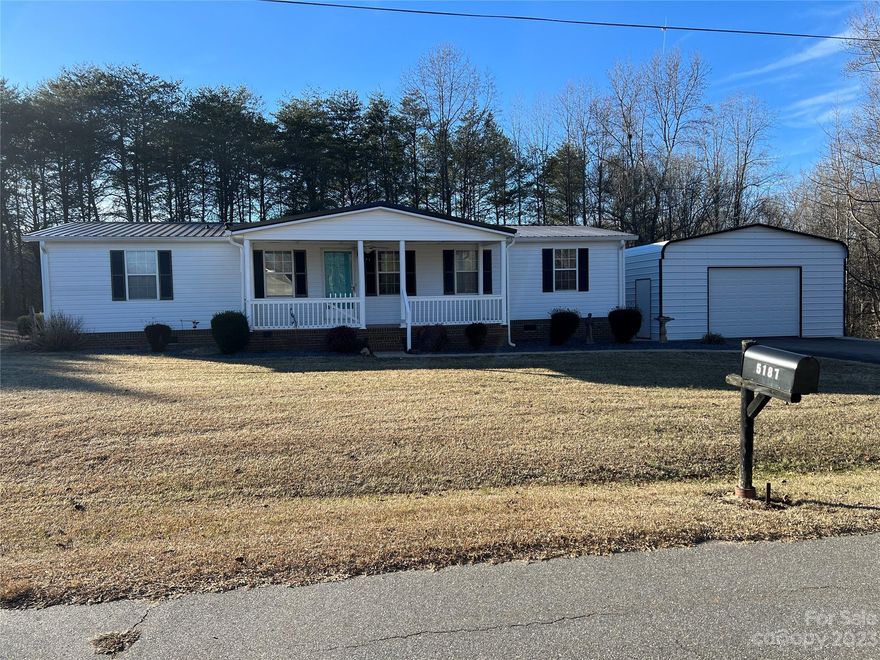 1990 triple wide manufactured home located in Claremont North Carolina approximately 1795 ft.² with 1.69 acres and a detached garage. Conveniently located between Hickory in Statesville and approximately one hour to Charlotte. Updates include within the last five years new roof, new gutters with leaf guards and new facia boards and new vinyl ventilated soffit, water filtration system, new heat pump, flooring, stainless steel appliances and a new shower in primary bedroom. Great neighborhood. Property being sold as is.