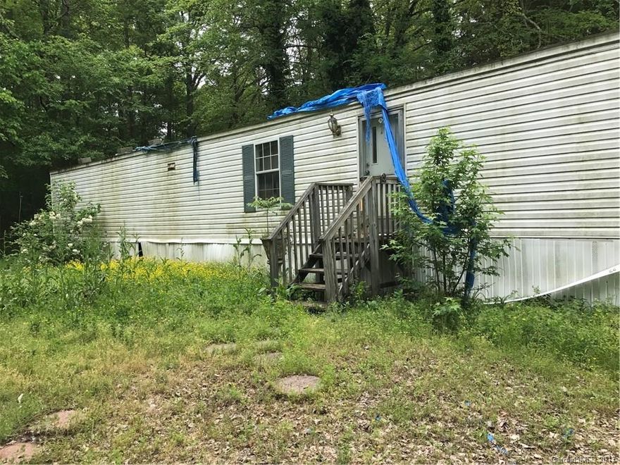 Great 1.13 Acre Lot in McConnells.  Perfect lot with well and septic for you to put your new home on, all the site work has been done for you already!  Private lot off the road and and very quiet.  Mobile home on property is being sold as is and is of no value.  Cone out and see this one today before its gone!