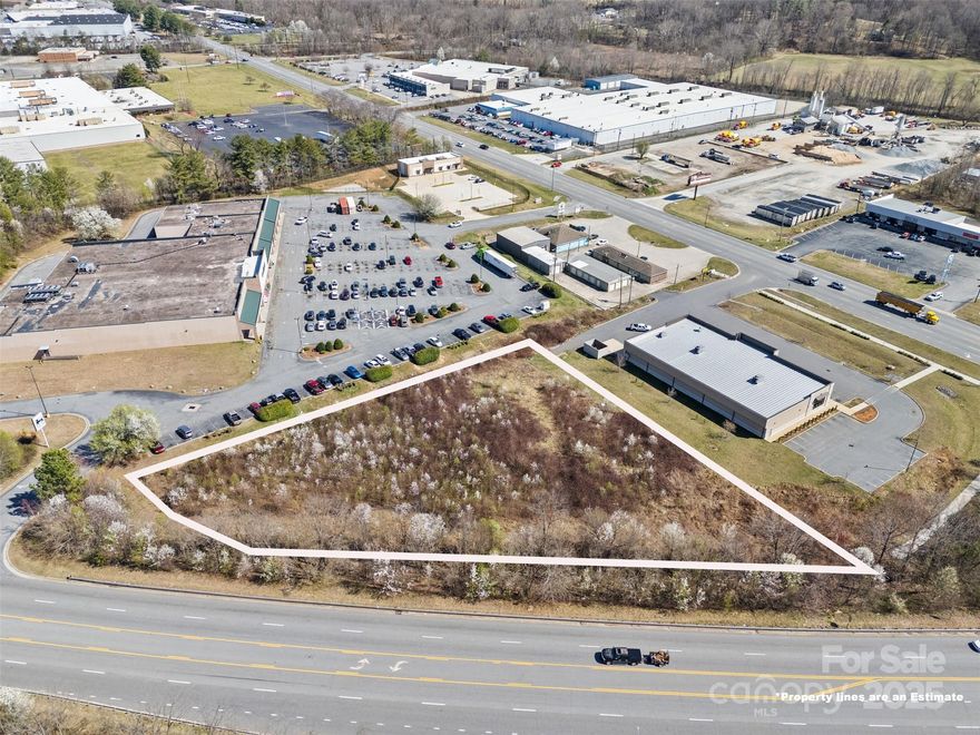 Prime 1.4-Acre Commercial Parcel - High-Traffic Location! Unlock the potential of this high-visibility parcel, positioned along a 4-lane divided HWY w/ ~ 8,300 vehicles passing daily. Zoned B2, this versatile property presents a rare opportunity for investors/developers/business owners seeking a prime location in Lenoir’s thriving CRE corridor. Situated just off a major intersection, this property benefits from exceptional accessibility & exposure. The site is adjacent to national/regional retailers, & other established businesses, ensuring a steady stream of potential customers. It is well-suited for a variety of business ventures including: Restaurant, Retail, Professional Offices, or Service Businesses. With access to municipal utilities & infrastructure, you can streamline the development process. Whether you're looking to establish a new business, expand an existing portfolio, or develop a multi-tenant commercial space, this property delivers max exposure in a high-growth market.