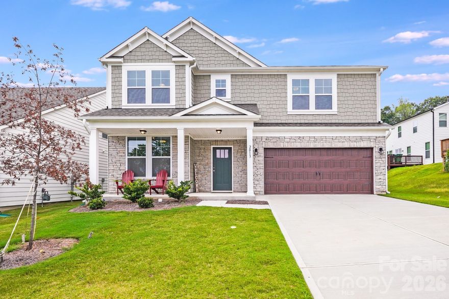Nestled in the serene new community of Kinghurst Cove, this 2024-built home offers a perfect blend of modern living and tranquility. Located on a cul-de-sac across from a walking trail and fishing pond, this move-in ready 5-bedroom home includes a main-level guest suite, expansive primary suite, loft, and dedicated office. Thoughtful upgrades abound: a climate-controlled four-season room, outdoor paver patio, epoxy-coated garage, and high-end ceiling fans. Conveniently located minutes from Charlotte Douglas Airport, Riverbend Village, and major highways, this home delivers flexible living, upgraded features, and an unbeatable location—perfect for today’s buyer!