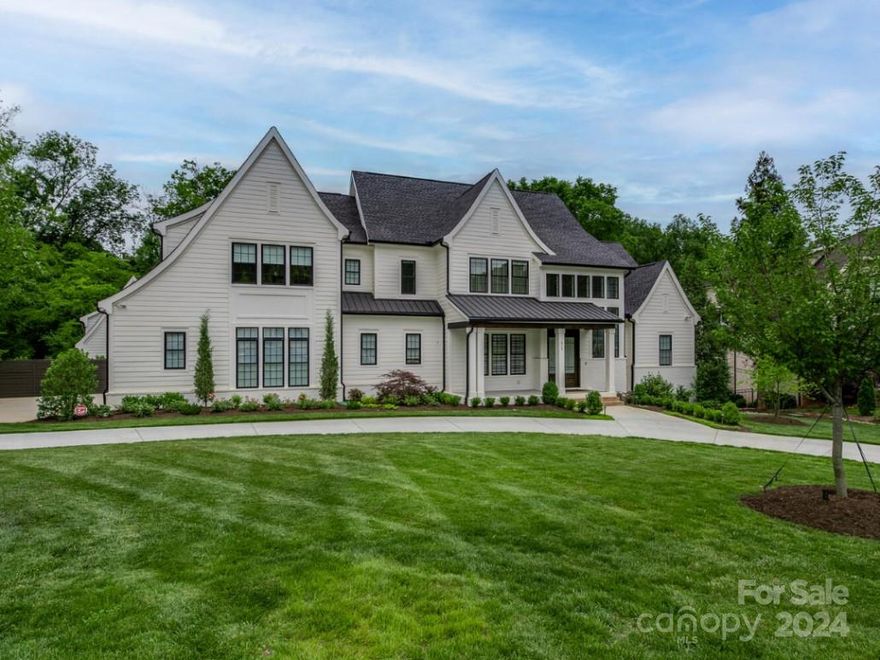 Discover Marvin's exclusive gated community, "Sage at Marvin." Only 12 home sites remaining! TO BE BUILT by Peters Custom Homes, the "Mammoth" floor plan showcases a luxury contemporary kitchen with frameless cabinets and waterfall edge countertops, complemented by a full scullery kitchen featuring additional sink, range, microwave & dishwasher. Primary on main offers a spa-like bath + oversized custom closet. Upstairs, includes three ensuite generously sized bedrooms, a dedicated fitness room, craft room, and spacious bonus room. Sage features 23 estate homes starting at $2 million situated on 1/2 acre to 5 acre wooded lots. True luxury homes featuring curated materials including Legno Bastone 7 to 12 inch wide plank flooring, zero entry showers, waterfall edge counter tops, frameless cabinetry, scullery kitchens, & oversized 3 + car garages. 12 -14 month build time. True concierge build process including dedicated in house design services to help you make your dream home a reality.