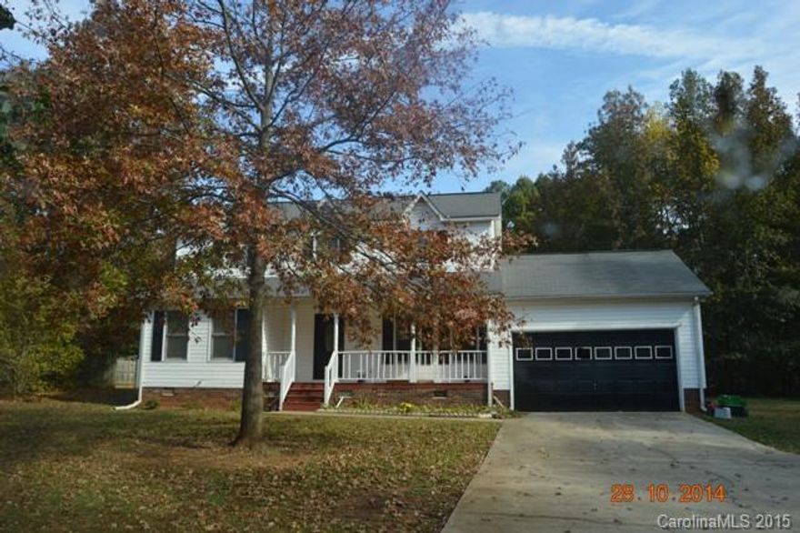 Nice home in quiet neighborhood, outside of town. Nestled on over half acre flat lot, large deck ideal for entertaining with sliding doors off eat in kitchen dining area and large square footage. With some updating, this home would truly shine. New stove, Heat/air just serviced. Priced thousands below tax value for quick sale. Motivated seller says bring us an offer and lets make a deal