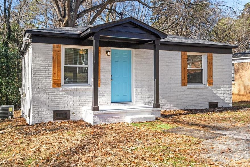 Welcome to urban living at its finest! This modern brick home, just minutes from the Lynx Light Rail Gold Line, Uptown Charlotte, and Johnson C. Smith University, offers a perfect blend of convenience and charm. Featuring 2 bedrooms, 1 bathroom, a great room, and a kitchen with updated appliances and fixtures. This residence is move-in ready. Enjoy the benefits of a new roof (2023), newer HVAC (2017) and windows (2017), fresh paint, a covered front porch, and a small covered back stoop. This property is eligible for down payment assistance, including 100% financing options with no PMI. Don't miss your chance to call this meticulously maintained property home!