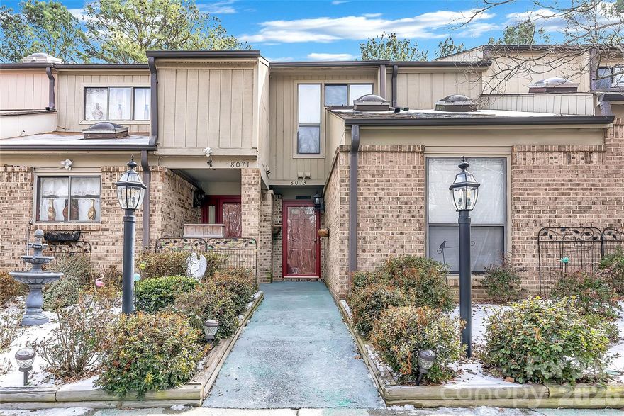 Welcome to the heart of it all in South Charlotte’s desirable Treva Woods! This stunning 2-bedroom, 2-bath townhome perfectly blends style, comfort, and peace of mind. Step through the charming red door into a dramatic 2-story living room, anchored by a real wood-burning fireplace and sleek, dark LVP flooring. The "cute kitchen" is ready for your culinary adventures, featuring a flat-top stove, pantry shelving, and a suite of newer stainless steel appliances (all under 3 years old).

Designed for flexible living, the main floor hosts a spacious guest bedroom with double closets and a full tile bath. Upstairs, you’ll find a massive private loft/primary suite complete with two generous closets and its own en-suite bath.

Worry-free ownership is the name of the game here! Major big-ticket items are already handled: a high-quality Lennox HVAC (3 years), newer roof (<10 years), fresh paint (<3 years), and plush carpet (3 years). Enjoy your morning coffee on the private back patio with extra storage, or cool off in the community pool. With a low $220/month HOA that covers water, trash, and exterior maintenance, plus two assigned parking spots, this home offers incredible value. Opportunities like this in 28226 do not last—don’t delay, schedule your showing today!
