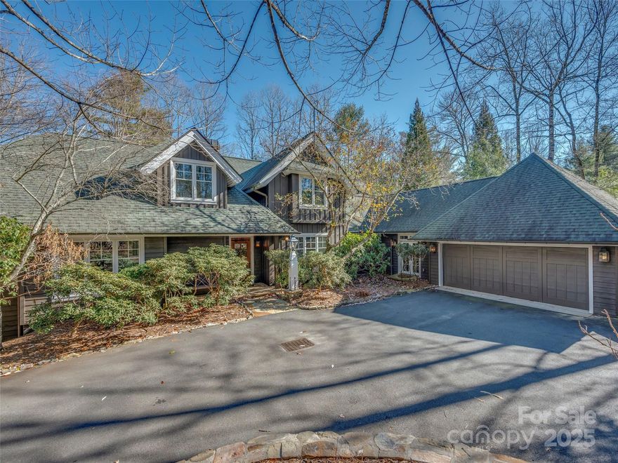 Nestled on a beautiful, private lot on the 13th hole of Tom Fazio’s Mountain Masterpiece sits this stately, yet warm and welcoming home. Solid custom construction and thoughtful design include the rich wood-trimmed coffered ceiling, built-ins, paneled passageways, and Rocky Mountain hardware. The spacious 2800 sf main level provides everything you need for daily living including the wonderful master suite with cozy sitting room and fireplace plus study with full bath that could be a second bedroom. A chef’s kitchen offers all you would expect, plus breakfast area, an adjacent large screened porch, walk-in pantry and laundry room. Then guests will enjoy a choice of a lovely upstairs suite or 3 suites downstairs where they can relax in the family room or the second screened porch. There is also a fenced-in area off the garage-perfect for pups. Furniture package available for purchase. Located in Champion Hills, just 8 minutes from downtown Hendersonville. Come see what makes us special!