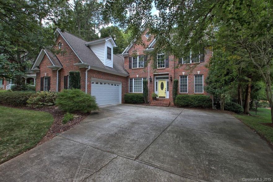 Over 3000 Sqft Brick Home on a Beautifully Wooded Cul-De-Sac Lot.  Beautiful Hardwood Flooring on Majority of 1st Floor. Open Floor Plan w/a 2-Story Foyer & Great Rm.  Formal Dining & Living Rm/Office.  Great Kitchen w/Granite, SS Appliances & a Breakfast Bar. Large Master Suite on Main w/Private Master Bath & Walk In Closet.  3 Bedrooms Up w/a Bonus or Media Room. Bonus could be a 5th Bedroom w/a full closet. Tons of Walk in Attic Storage. Huge Deck,  Fenced Yard & Oversized 2-Car Garage.