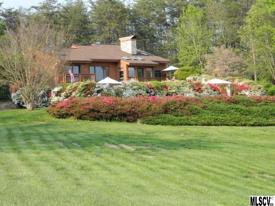 Three acre private setting with mountain views! House plan features an open kitchen and dining experience with granite countertops, tile backsplash and stainless steel appliances. Living room has a rock fireplace and a loft. Lower level offers an office, full bath, den, wet bar and recreation room. Owner will leave the pool table. Exterior features stone and cedar siding. Enjoy the outdoor amenities of the in-ground pool, decks, and a gym set for the kids! Storage building for your lawncare equipment. Truly a must see! You will not be disappointed.