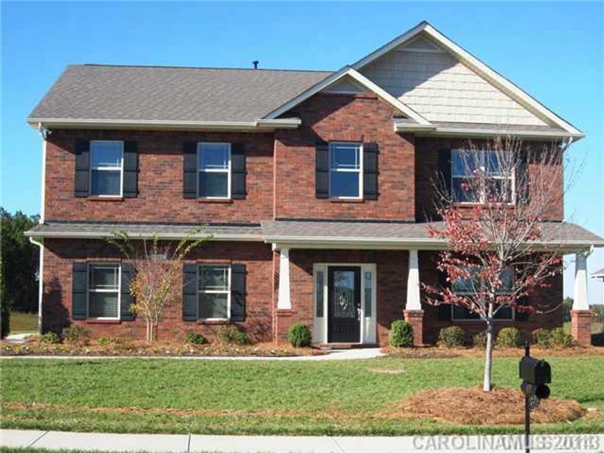 Former model home.  Large corner site.  16x14 covered rear patio.  Several rooms of hardwood flooring. Granite countertops in kitchen with tile backsplash. Granite countertops in full bathrooms. Stainless appliances.  Side load garage.  Full irrigation.  Incredible savings of over $40k