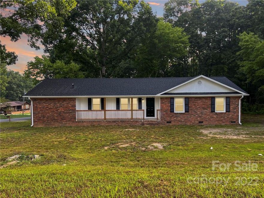 One Level all brick home with carport and corner lot.