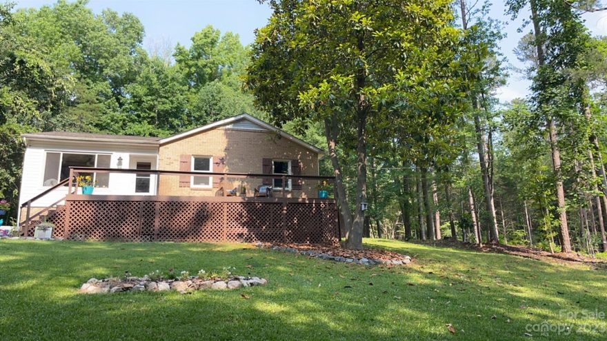 Welcome to this beautifully remodeled home located in Sturgis Estates (Behind Target Shopping Plaza) 
Through the artful redesign of its interior and exterior, you'll see that no detail was left to spare.  Updates include: New Roof, New HVAC, New Hot Water Heater and New Windows in 2021.  From gorgeous tile floors, to custom cabinets and countertops, you'll enjoy all of the modern updates while living in this peaceful country setting.  You can enjoy coffee on the front porch as well as entertain on the screened-in back patio.  Storage Building conveys with the property.  With no HOA and being conveniently located near shopping, restaurants and I-77, this one won't last long!