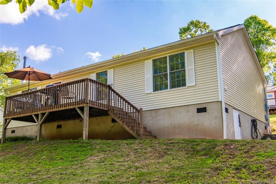 Relax on your front deck on private dead end road & then enjoy the mountain view or hike the Bent Creek trails from your own private access to the Pisgah National Forest. Well cared for home with stone surrounded wood stove in living room & owner's suite with bath. High crawl space for extra storage.  USDA eligible & move in! Yard perfect for entertaining, pets or garden.