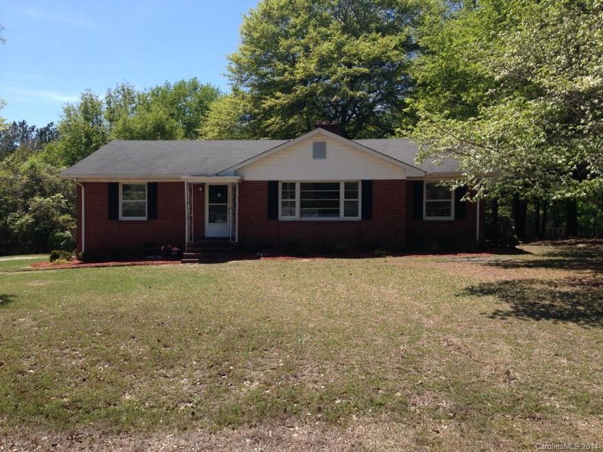 Beautiful renovated brick ranch. Quite neighborhood, home is located on dead end street. Walking distance to Pageland Elementary school. Over 1600 sq. ft. under roof. Large living room and Den, both have a fireplace.  
Large modern kitchen with dining area. 2 Bedrooms and 2 baths & Laundry room View wild life from sun room. Den could be easily be turned into 3rd Bedroom. Rear attached 1 car carport and  beautifully landscaped. Property and location approved for USDA Financing.