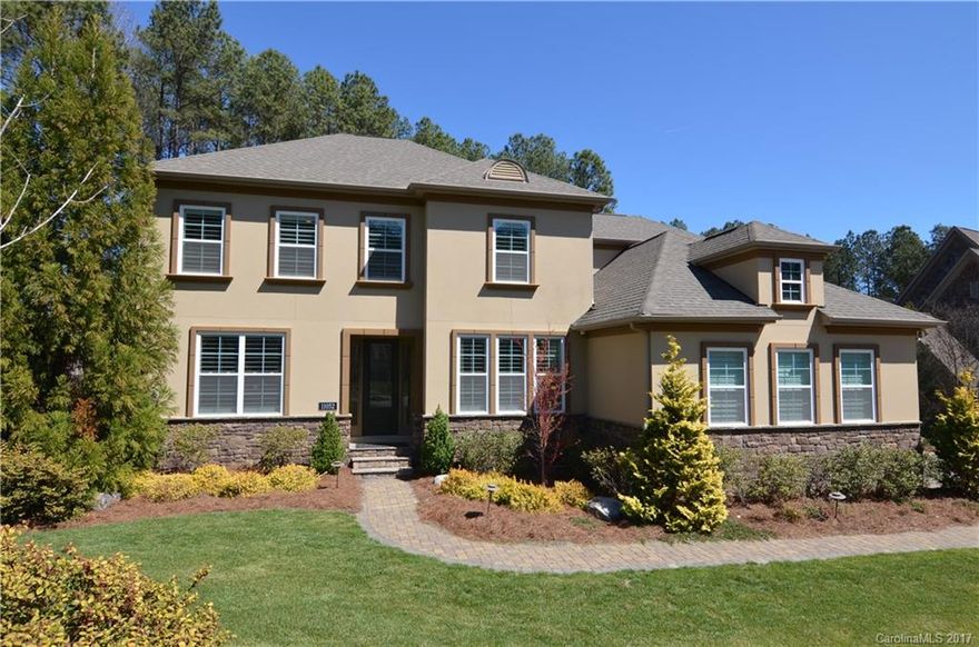 Custom former Model Home on premium corner lot in lakefront community, desirable Preservation Pointe, Mountain Island Lake, Charlotte! Office w/French doors. Kitchen w/lots of espresso cabinets, granite counters, 5burner gas c/t, lg. center island, opens to GR. Easy to entertain large gatherings! Master on Main w/dual walk-in closets, w/spa-like marble Master BA that is magazine worthy! Updates galore! Bonus & Rec. Rooms up w/3 BRs. Back yard with private patio, screened porch, surround sound!