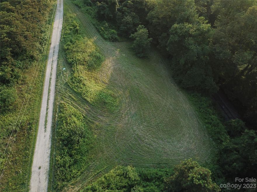 Looking for a couple of acres to build your Mountain home...Look no further!  With Long-range mountain views, privacy, minimal restrictions and just minutes from downtown Waynesville this lot awaits your vision! 
Located in the well-established community of Barbers Orchard you'll find access is easy via the nicely-sized, well maintained gravel drive.  Lot features plenty of cleared space so you can quickly pick out the best home spot.  
Work from home, no problem, as High-speed internet is available. Up to date Septic Permit on file with the county allowing for up to 3 bedrooms.  Bring your house plans & make 2024 the year for your New Home!