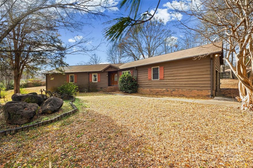 Welcome home to this charming property located in the established Freedom Acres neighborhood. Situated on almost a one acre, cul-de-sac lot with no HOA, this 3 bedroom, 2 bathroom home offers 1,964 square feet of comfortable living space and plenty of room to enjoy outdoor living. The oversized living room, equipped with high ceilings and a large gas fireplace makes the center of this home cozy and inviting. 

It's prime location provides convenient access to the interstate, Concord Mills, Charlotte Motor Speedway and a nearby airport, making commuting and entertainment a breeze. Enjoy the privacy, flexibility and freedom that comes with a large lot in a well-established community while still being close to everything the area has to offer. You won't want to miss this opportunity.