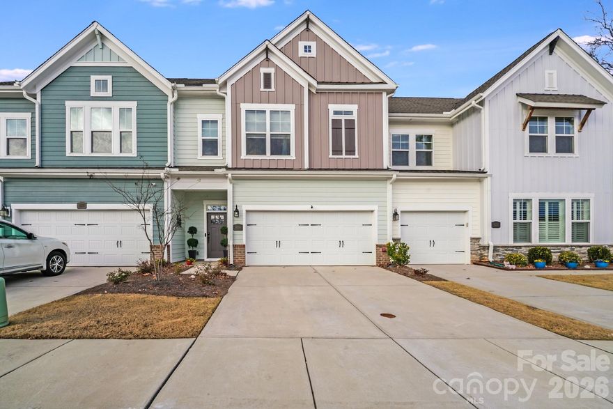 Experience refined living in this impeccably maintained luxury townhome, offered by the original owners and enhanced with over $25,000 in thoughtful upgrades. The main level showcases rich hickory hardwood floors and an inviting great room, perfect for unwinding beside the striking electric fireplace. The gourmet kitchen is a true showpiece, featuring custom cabinetry, quartz countertops, a designer backsplash, stainless steel appliances, and an expansive oversized island ideal for entertaining and gathering with guests.Retreat to the private primary suite, complete with hardwood flooring and an exceptionally spacious walk-in closet. The spa-inspired ensuite offers dual vanities and a beautifully tiled walk-in shower. The third level provides a versatile loft space, perfect for a home office, den, playroom, or additional living area.Step outside and enjoy your own private outdoor oasis with a fenced backyard and custom paver patio that is ideal for weekend relaxation. The two-car garage has been upgraded with a sleek epoxy floor, adding both style and durability.Ideally located just minutes from Birkdale Village for premier shopping and dining, and a short drive to Lake Norman, this home offers luxury, comfort, and convenience in one exceptional package.