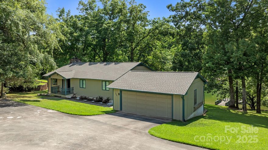 Step into a captivating lakeside retreat at 1465 Friar Rd, Rock Hill, SC, a self-custom home crafted by its owner-builder for cherished family memories. Nestled on a sprawling flat double lot in a peaceful Lake Wylie cove, this sanctuary offers unmatched privacy and 200 ft of stunning waterfront with a dock for easy boating. Inside, a spacious floor plan flows with airy bedrooms, a grand living room with a cozy fireplace, and countless windows flooding the space with natural light. Enjoy year-round lake views from a beautiful sunroom. The nearly 2000 sq ft unfinished basement, with a bathroom and second fireplace, is ready for your vision: extra living space or entertainment area. A detached two-car garage with workshop and ample parking adds practicality. With a 2.5-year-old roof, geothermal heating, and year-round pest care, this move-in-ready or customizable Lake Wylie gem radiates warmth and endless possibilities and a lot that is premium on the water you won't want to miss!