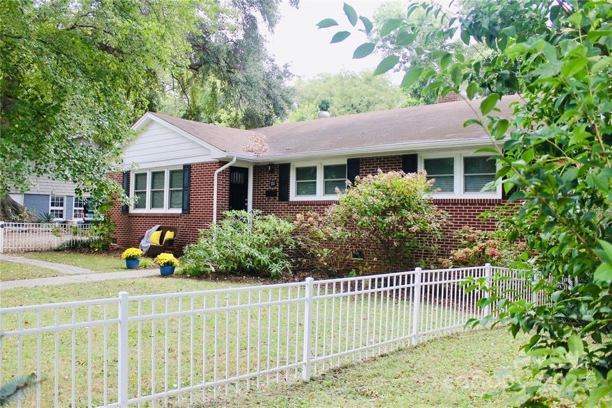 Welcome to the perfect historic brick cottage complete with fenced front garden of native flowering plants.
Built in 1952 and recently renovated you'll love the charming character, open layout, modern kitchen, updated bathrooms, crown moldings, and gorgeous cocoa bean hardwood floors throughout.

Additional highlights including newer HVAC, newer windows with custom blinds, stainless appliances, walkout basement, garage/enclosed carport with laundry, and large backyard.
This move-in home is within the York Chester Historic District, NO HOA
Convenient to downtown, FUSE, Loray and major highway access