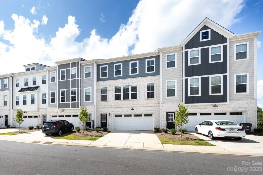 FABULOUS newer construction townhome located in Indian Land! This home is the perfect layout which features a large bonus area on the ground floor, which also has access to a full bathroom. The bonus area leads out to a covered back patio area. The second level of the home features a gourmet kitchen with quartz counters, a large center island, plenty of cabinet space for storage and stainless appliances. There is an office nook on this second level. A large screened porch is just off the livingroom area. Retreat to the third level, and you will find a large primary bedroom complete with a large walk in closet and private en suite bathroom with stand up shower and double vanities. There are 2 generously sized guest bedrooms, a full bathroom and laundry room to complete this level.