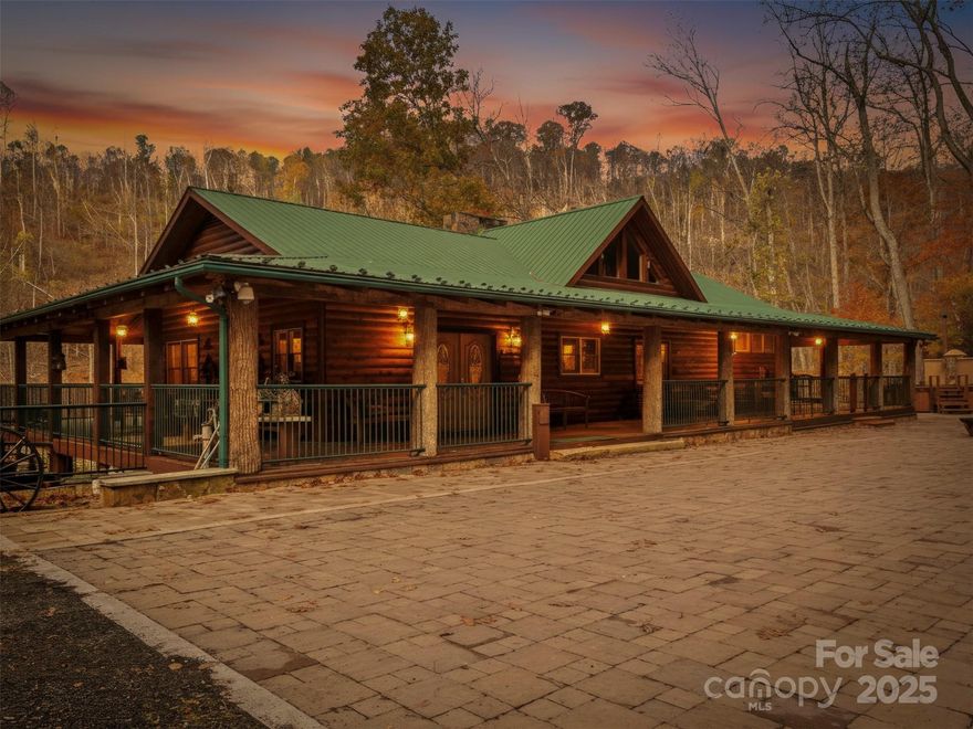 A true statement piece sitting over the bold Little Rock Creek. Enter your personal gate code and park on the beautiful stone drive/entertainment area. Step out of the car to hear the roar of the water. Featuring an outdoor kitchen, waterfall, and hot tub. The beautiful covered porch wraps around for the gorgeous view of the rushing creek. Wind down the steps for fishing and swimming right out of your own door. Both levels have outside entrance. Off to the side is a gorgeous courtyard that feels a little like Italy. Come inside to soaring ceilings and an open floorpan excellent for entertaining. Main floor features a custom kitchen with Viking appliances. The centerpiece is a stone double sided fireplace. Tastefully decorated and furnished. The spacious dining area for a big gathering. A nice cozy living room and a half bath for your guest. A big beautiful primary bedroom with a spa like ensuite and roomy walk in closet. Downstairs you will find another living area, a small fridge, sink, wine cooler, a utility room, laundry room, three more bedrooms and each have there own full bath across from them. All furnishings included minus the sellers personal items. This property is private and would make the perfect
getaway or full time residence. There is also a generator on the property which operates the whole house should you need it. Septic and well.