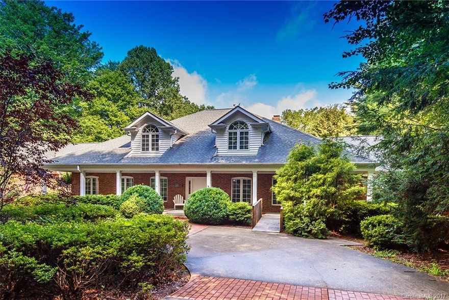 Absolutely gracious stately 4 BR, 3.5 BA brick home on a remarkable 13.2+/- acre site with view of the mountains just outside the city limits of Brevard. Mostly on one level, this home features high ceilings, 2 fireplaces, large master suite with private covered porch, large screened porch, charming library with extensive book cases, and gorgeous back terrace overlooking a rolling lawn and the mountains. On 2 parcels, 2nd PIN 8585-43-5622-000.