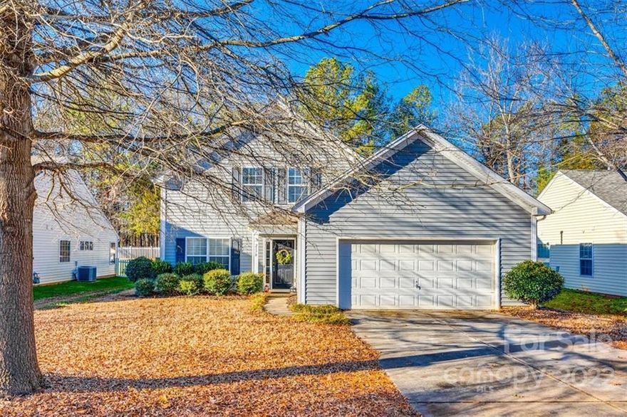 Back on the market with updates! Fresh paint and carpet - ready to move in! This home has a primary bedroom on the main floor and is located in a feature packed community! Neighborhood amenities include pool with slide, indoor and outdoor basketball court, fishing pond, playground, fitness center, tennis courts, volleyball courts and picnic areas. New vinyl plank flooring, large fenced back yard and large closets! Great location, convenient to all Indian Land has to offer and minutes from Ballantyne, Waxhaw and Fort Mill. 100% financing available. Make this one yours - schedule a showing today!