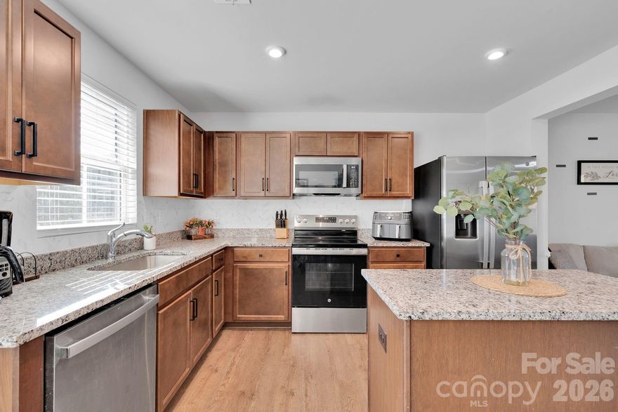 This beautiful, 2024, 3-bedroom, 2.5 bath townhome features an open floor plan with stylish granite countertops, stainless steel appliances, and a bright, inviting updated kitchen perfect for entertaining.  On the ground level, enjoy a flexible separate area perfect for a home office, study nook, play space or even a guest sleeping area. Thoughtfully designed with both style and function in mind, this home offers comfort, versatility, and low-maintenance living—all in a beautifully maintained setting.  Conveniently located near shopping, dining, and major highways, just 15 min from the heart of uptown. Refrigerator Included!  Qualified purchasers may receive up to $10,000 in buyer incentives, which can be used toward closing costs, etc.  Property is also marketed as a rental and rent to own option is available.