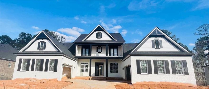 Welcome home to this luxury unlike any other. Boasts 12ft ceilings throughout the home with detailed
coffered and tray ceilings included. Sprawled out with the convenience of everything on one level. Lots of
windows to let in ample natural light. Giant 10ft sliders open up to a 41ft lanai. Standard double island in
the kitchen, large butler's pantry and secondary kitchen are just some of the included unique features.
Options to add sports bars, wine room, outdoor summer kitchen and more. This proposed Jones Homes
new construction includes signature designs, cutting-edge technology and luxury features built for the
way you live today. Stop by our model homes to see this plan today!