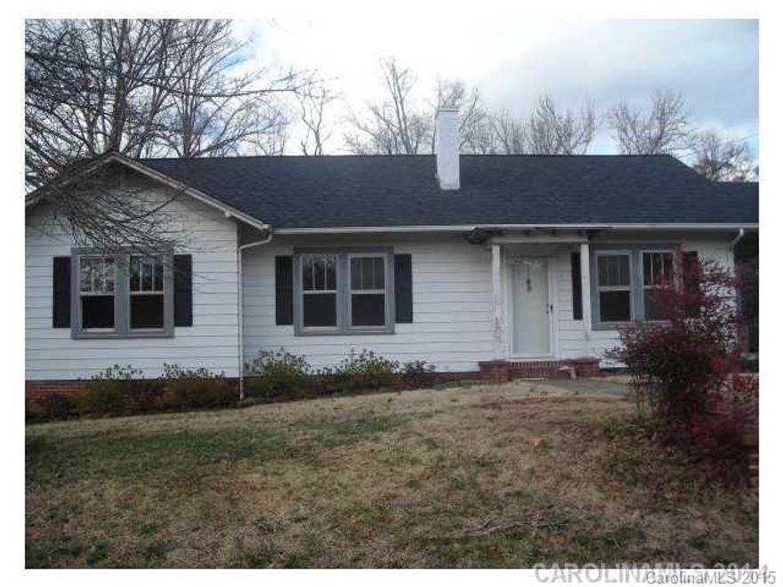 Home located on dead-end street and private with in-ground heated pool.  Circular drive and carport.  Home has fresh paint and new trim.  Kitchen has lots of cabinets and spacious.  All appliances remain and wood floors in living room and den.  Built-in fireplace and so many extras.