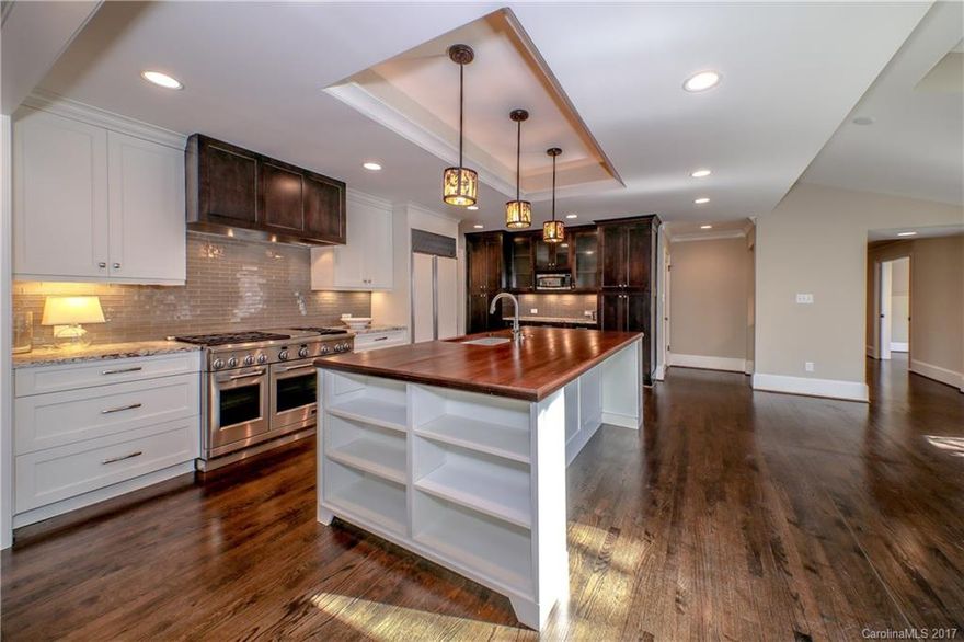 A hidden ARCHITECTUAL TREASURE tucked on 2.91 acres in South Park! Providing a lifestyle that is hard to find with the feeling of being in the mountains! Over 5000 sq feet of living on one level. Beautifully remodeled chef's kitchen, 4 fully remodeled baths, hidden garden off master, indoor therapy pool, incredible artist studio & playroom/guest suite, wine cellar, additional wine room/safe room, outdoor fire-pit, barn, playhouse. Sellers offering 1 year home warranty. Amazing must see property.