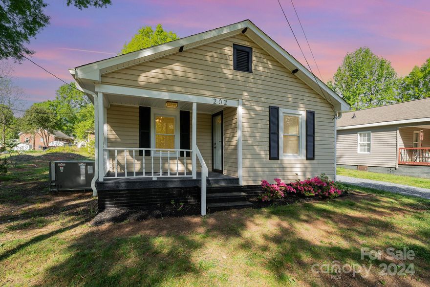 Rare Deal! 2 bedro0m 1 bath featuring all new luxury vinyl plank floors, updated bathroom, new kitchen featuring new cabinets with granite counter tops, tile back-splash, all new Samsung appliances including refrigerator, stove, microwave, and dishwasher. Laundry room complete with new LG Front Load Washer and Dryer. Brand new roof, new interior doors and hardware, updated electrical with new panel, new water heater, all new light fixtures, updated shared driveway and landscaping. Complete with a home warranty up to $700  and seller is offering $2500 in closing costs if under contract by April 21st! Convenient location! Seller is a licensed NC real estate broker. Fireplace is decorative only and sold as is.