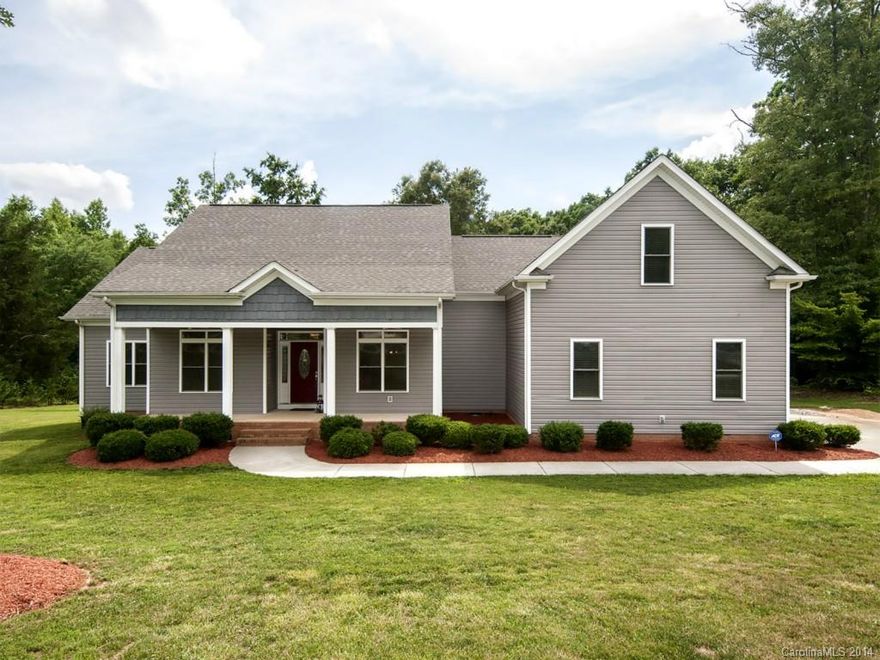 Fantastic custom ranch, bonus room w/half bath upstairs, 1.99 acre lot w/pond on edge of property, 3-car side load garage, beautiful neighborhood w/no HOA.  Open floor plan w/split bedroom plan. Office w/French doors on main floor. Great room w/gas log fireplace. Morning room/sun room. All bedrooms have their own baths. High-end finishes: hardwoods, tile, granite, SS appliances, gas cook top, kitchen island, & more. Front porch and back deck. Refrigerator, washer and dryer convey. Home warranty.