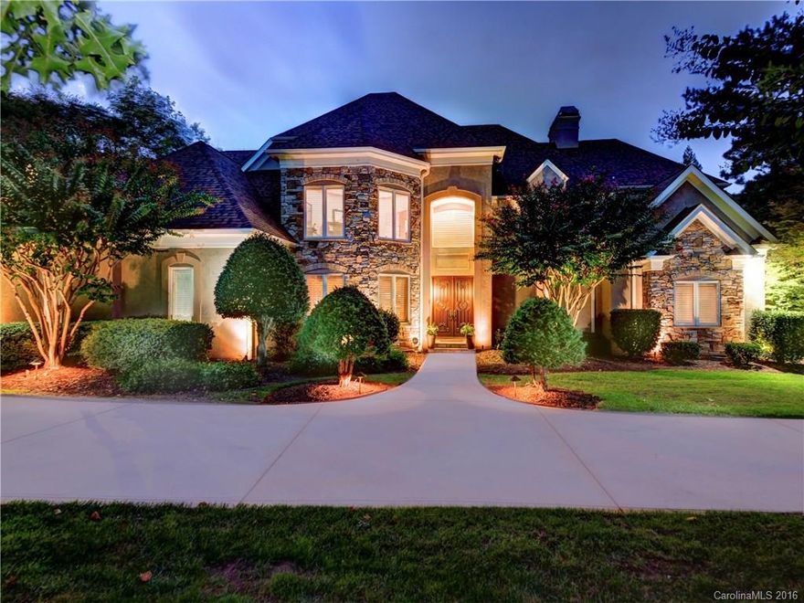 A grand feeling comes over you the moment you step foot in this beautiful custom Simonini home! Majestic entrance opens to the best in open floorplan living. Coffered ceilings, custom molding, no luxury detail is spared! Kitchen has custom cabinetry, center island is large enough to dine. Master on the main w/ spa-like bath & large walk-in closet. 4 bedrooms, 3.2 baths. Tons of storage, including attic. Covered terraces up & down. Back yard is a breathtaking oasis, with pool & spa. Must see!