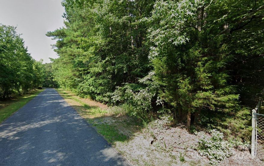 6 acre wooded lot on Rosemont Road is waiting for you to build your dream home! No city taxes. Small portion of the property in floodplain area.