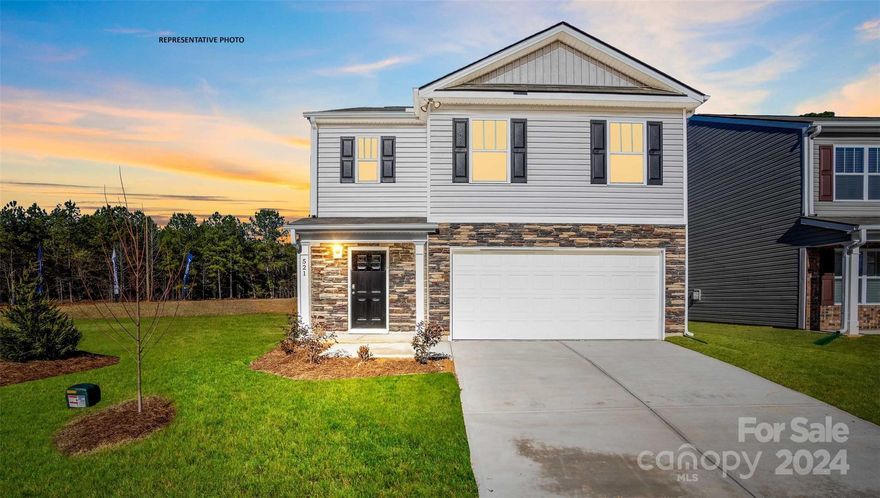 THIS HOME IS UNDER CONSTRUCTION The Robie is a spacious 2-story home showcasing 5 bedrooms, 3 bathrooms, & 2-car garage. Open floorplan features 1st floor guest suite with full bath, second floor loft area and upstairs laundry room. At the heart of the home is the beautiful kitchen with stainless steel appliances, granite countertops, ample cabinet space, tile backsplash, walk-in pantry and spacious island. Upstairs you will find the large primary suite with walk-in closet, spacious secondary bedrooms with full bath and the laundry room. Community offers pool, cabana, bocce ball, playground and walking trails in sought after location, close to Rock Hill and Fort Mill conveniences. REPRESENTATIVE PHOTOS