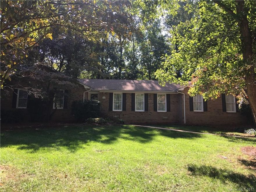 Location galore and super cute and mature neighborhood in-town in Shadowbrook! Minutes away from Winthrop University, shops, restaurants and down town Rock Hill, SC.!  This is a great all brick ranch in a cul-de-sac with mature dog woods, hard woods and azaleas! There is a ramp for the rear entry that can be easily moved making the concrete patio much larger or if a ramp is needed it can stay! This house has been meticulously maintained and cared for over the years! Come see this gem today!