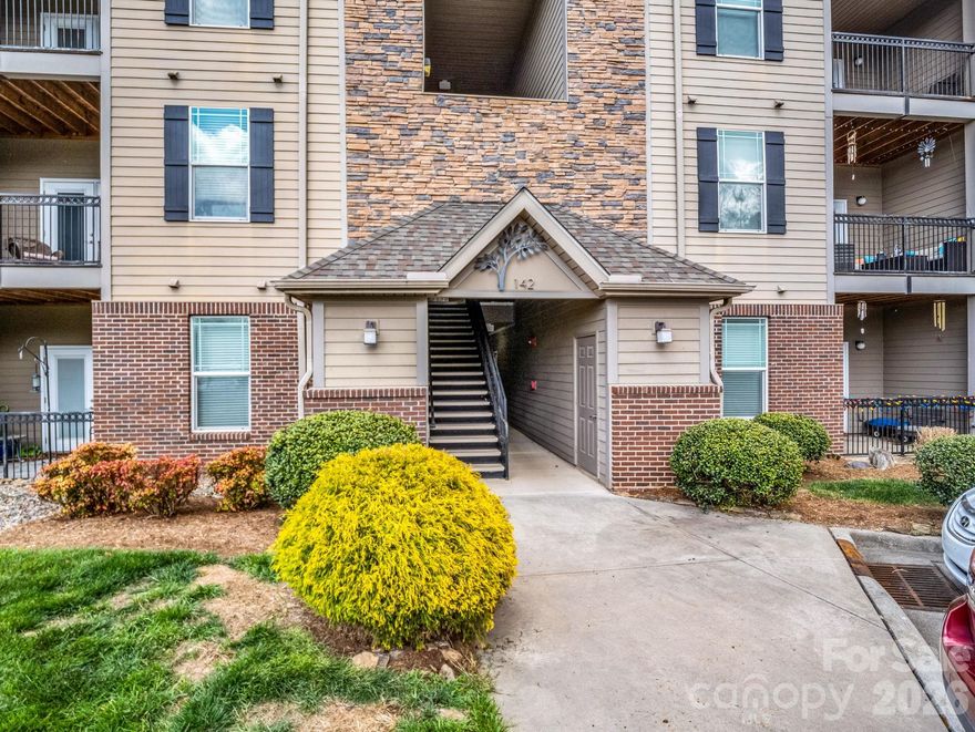 Step into easy living with this first-floor condo—no stairs, no stress! Located in the desirable Brickton Village community, this one-owner home, built in 2016, offers comfort, convenience, and low-maintenance living.
Featuring 2 bedrooms and 2 full baths, the spacious layout includes high ceilings and a roomy primary suite complete with a walk-in closet and private bath. The kitchen is both stylish and functional with granite countertops, stainless steel appliances, and a pantry for extra storage. Enjoy peaceful mornings or relaxing evenings on the back porch overlooking the beautifully maintained grounds and garden area.
Perfectly situated between Asheville and Hendersonville with easy access to I-26, this location offers both convenience and connectivity. Community amenities include a walking trail, dog park, and grilling/picnic area—perfect for enjoying the outdoors close to home.



HOA covers landscaping, garbage, water, and sewer, making everyday living even easier. A 1-year home warranty is included for added peace of mind. Owner-occupant only community—no rentals allowed.



Don’t miss this opportunity for comfortable, one-level living in a fantastic location!