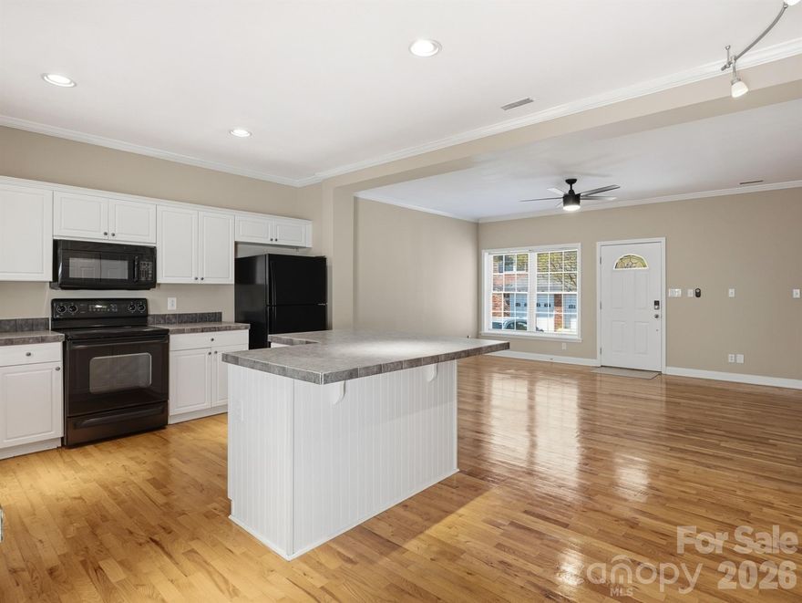 Well-maintained brick townhome with attached garage in an established community, conveniently located near I-485 and I-77, with easy access to shopping, dining, and grocery stores. Beautiful new carpet upstairs, new hot water heater, new ceiling fans and new bathroom exhaust fans.  The main level features newly refinished hardwood floors, fresh interior paint, and an open floor plan ideal for today’s lifestyle. Upstairs offers two spacious bedrooms, each with a full en-suite bath, plus a convenient half bath on the main level. Enjoy outdoor living on the private patio. HOA includes clubhouse, outdoor community pool and lawn maintenance, offering low-maintenance living.