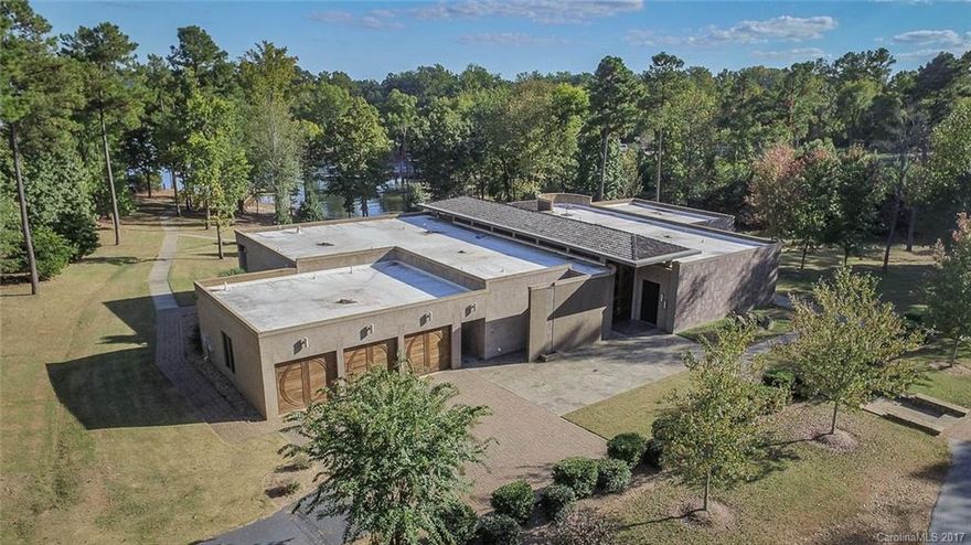 For many, stunning main channel views of Lake Wylie are enough to capture even the most demanding home buyer.  For others, the distinctive contemporary architecture, with over 6500 square feet of living space, signaling a one of a kind custom home compels the attraction.  Add in generous outdoor living space with swimming pool, hot tub and pool house leading to a gorgeous, multi-level dock and most will be thinking “welcome home.” Auction starts 11/18/2017.