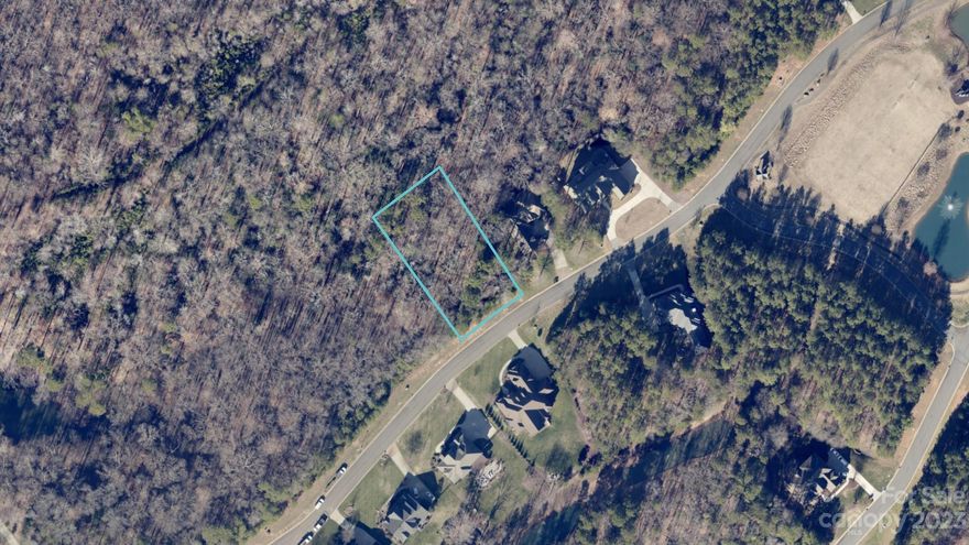 Rare opportunity! Check out this .62 acre lot with DEEDED BOAT SLIP w/boat lift. Slip #29 is 24', valued at $30K. This lot sits deep in the gated community of Reflection Pointe. This deep lot is suited for a crawl or walkout basement construction with room for a pool.  The lot is also near the recreation/soccer field.  Build with one of the Featured builders or your builder. Note: New builder must meet the requirements to build.  Community amenities include a clubhouse, pool, tennis/pickleball courts, paved walking paths, marina area, waterfront pavilion, boat/RV storage, and more.   The community is 10 minutes from downtown Belmont, which offers restaurants, breweries, pubs, retail, Harris Teeter , and more.  Commute time is 30 minutes to Uptown Charlotte and 20 minutes to the airport.  If you are looking for lake life and the small-town feel of Belmont, this location is a must-see! Minimum build 2000 HLA for a 1-story, 2400 HLA for a 2-story above grade, and meet building guidelines.