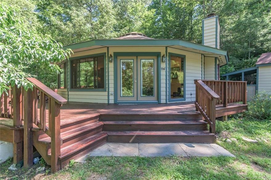 Adorable updated deltec home w/ cedar siding,reclaimed Granary Oak floors, Porcelin tile in kitchen and baths, Belmont Alder soft close cabinets and auto close drawers,septic assist garbage disposal, quartz and honed granite counter tops in kitchen and baths, all new fixtures, walk in custom tile shower, tankless gas water heater, 2.41 acres with room to build another home, 30 ft. deep pond for swimming stocked w/ large mouth bass and sunfish Private,quiet retreat w/low taxes 20min to asheville!