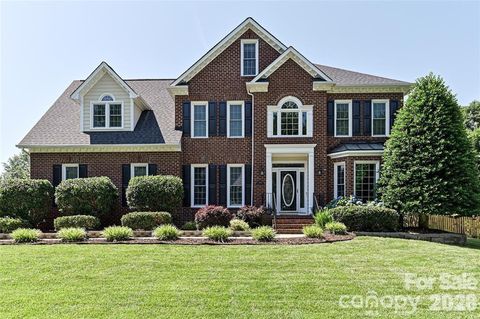 Photo of 7068 Kidwelly Lane, Matthews, NC 28104 (MLS # 4379419)