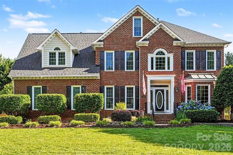 Photo of 7068 Kidwelly Lane, Matthews, NC 28104 (MLS # 4379419)